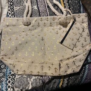Elegant Cream Tote with Gold Anchor Design
